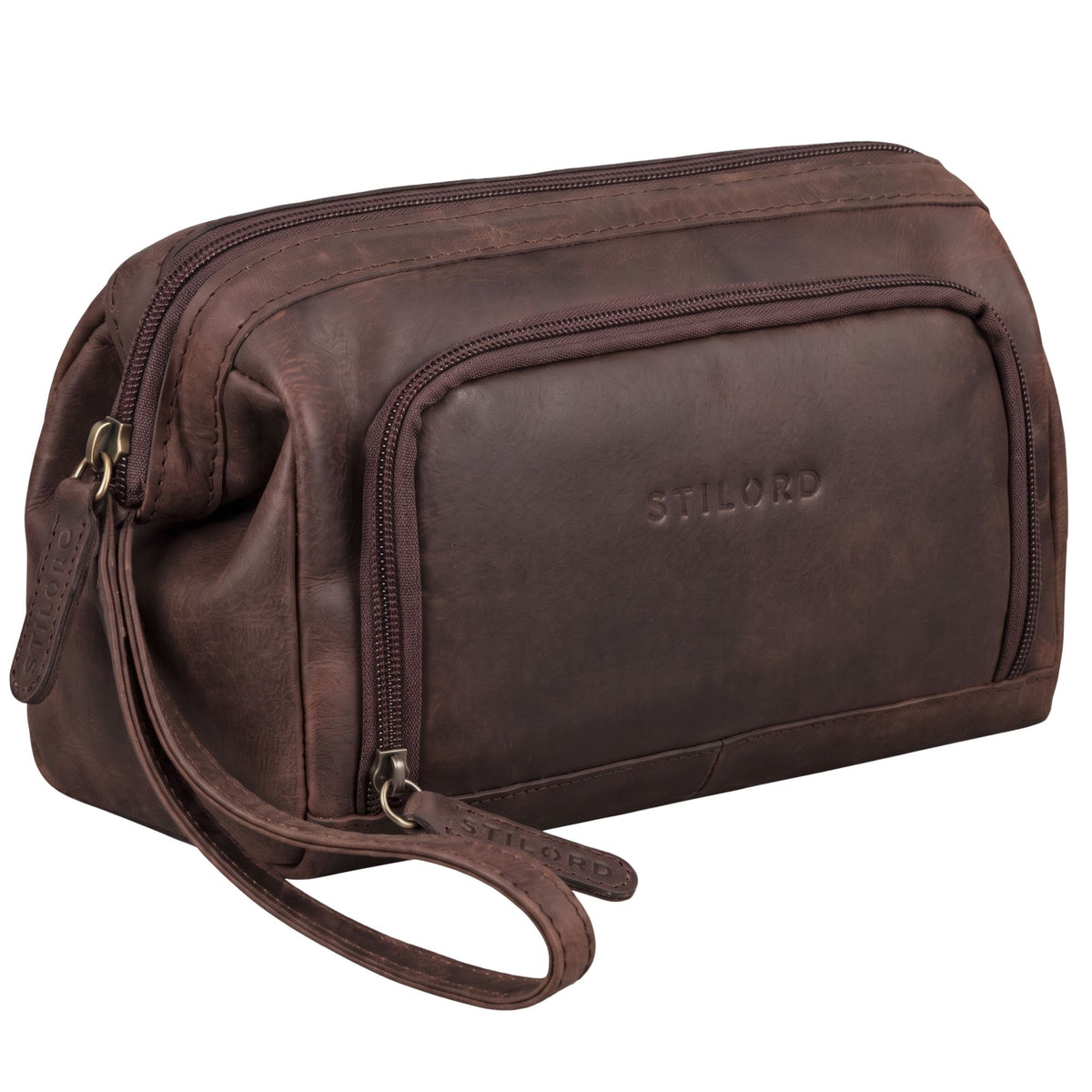Trousse de toilette en cuir marron Henry avec logo STILORD embossé, poche avant et poignée bracelet, vue latérale