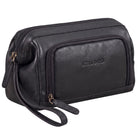 Trousse de toilette en cuir noir, vue de détail frontale avec logo STILORD embossé, fermetures éclair et dragonne visibles