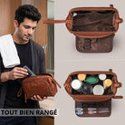 Trousse Henry en cuir marron maraska, ouverte avec compartiments intérieurs; homme range produits dans la salle de bain